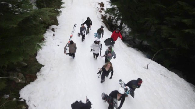 INSANE 14 person snowboard + ski train cablecam shot!!