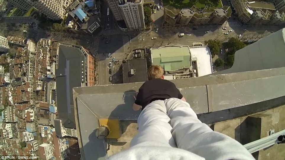 Daredevil Performs Handstands On The Edge Of Skyscrapers Around The World