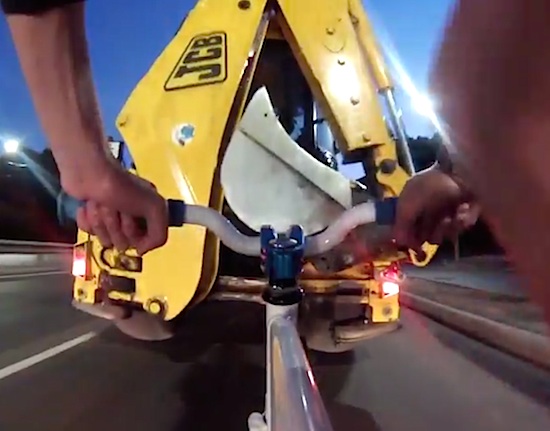 Watch A Fixie Rider Slam Into The Back Of A Backhoe. FAIL!